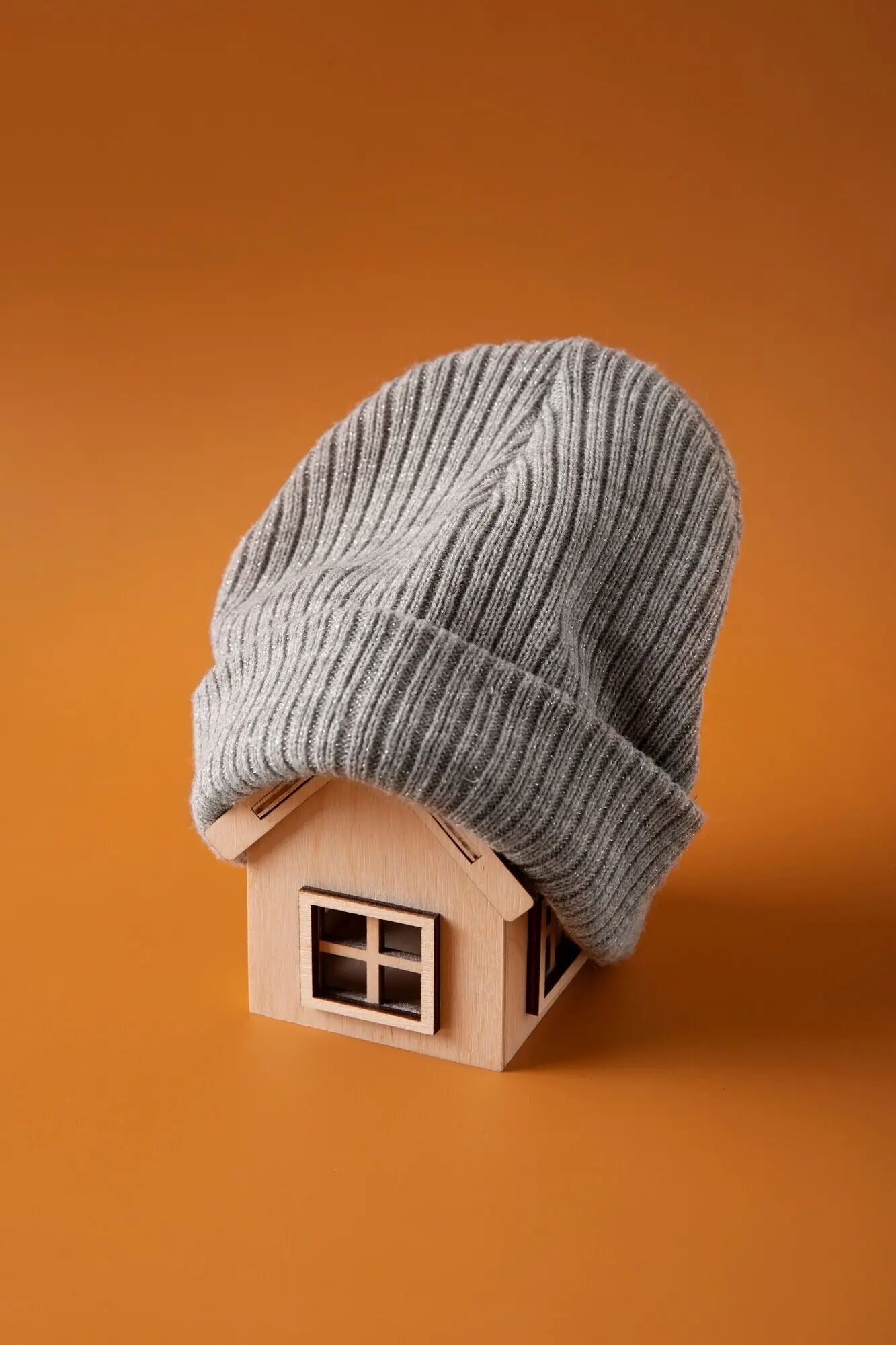 Concept of a cozy house with a wooden toy house