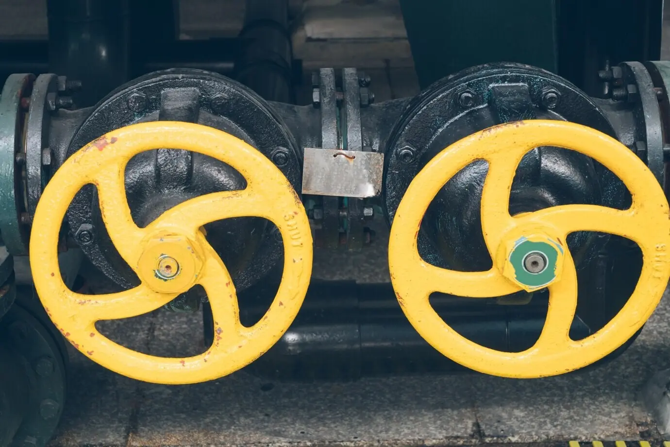Steel pipelines and cables within a plant.